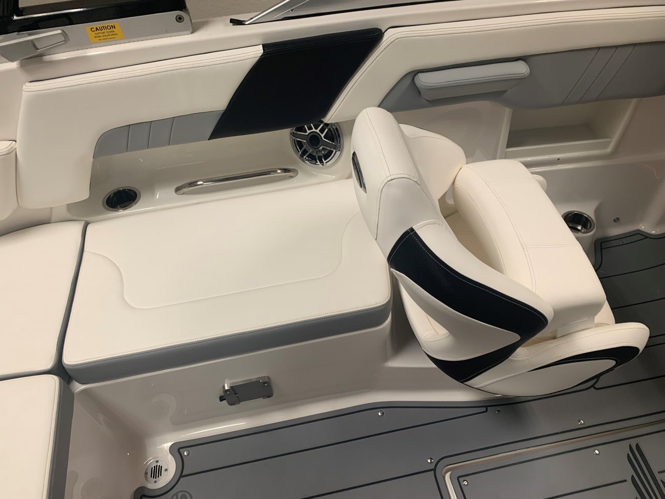 Wakeboarders want a giant wake to launch from as they cross from left to right behind the boat. With the engine set back against the transom, these boats carve a steep, large wake that riders love.