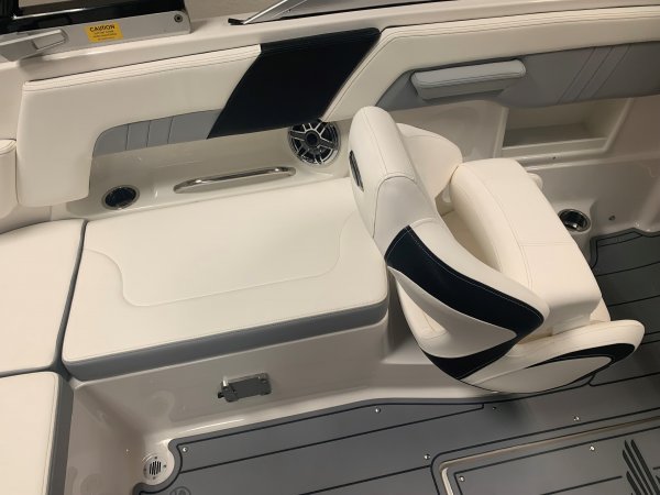 Wakeboarders want a giant wake to launch from as they cross from left to right behind the boat. With the engine set back against the transom, these boats carve a steep, large wake that riders love.