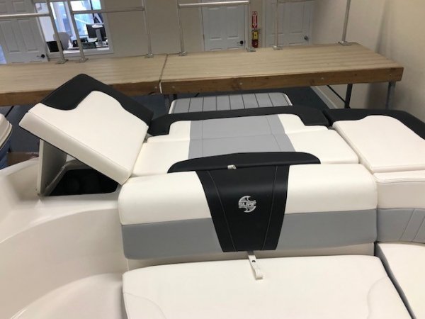 Glass fibers either loose or woven, reinforced with resin and used in the construction of many boats.