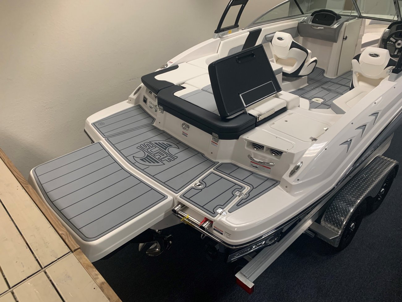 A ski boat is a boat specifically designed to safely tow one or more water skiers. This is achieved by using a high-horsepower, marinized automobile engine usually positioned in the midsection and driven through a direct drive to the propeller.