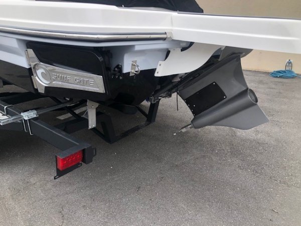 Zipping about on skis established a reference point for watery adventure. Truly hardy souls could push the envelope by ski-jumping a ramp or by not using skis at all - barefooting seemed to be the very edge of watersports world.