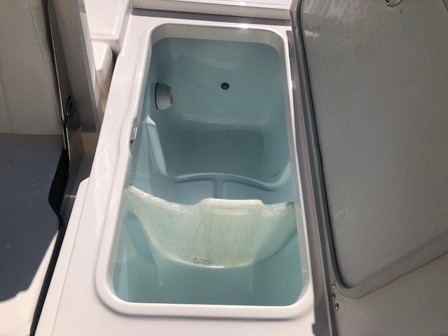 The definition of an outboard motor is a detachable engine mounted on outboard brackets on the stern of your boat.  This configuration will have only one single engine.