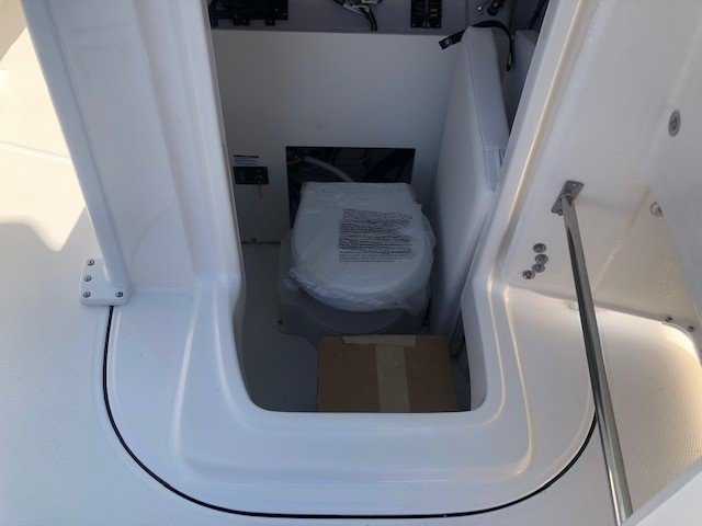 Generally, a Sportfisherman will be a large craft with a fly bridge and outriggers designed to pursue big game fish.  These will be 35 feet up in length and contain all of the amenities to handle heavy blue water.