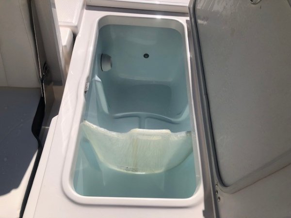 The definition of an outboard motor is a detachable engine mounted on outboard brackets on the stern of your boat.  This configuration will have only one single engine.