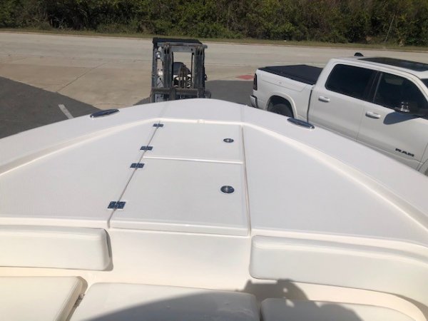 The definition of an outboard motor is a detachable engine mounted on outboard brackets on the stern of your boat.  This configuration will have only one single engine.