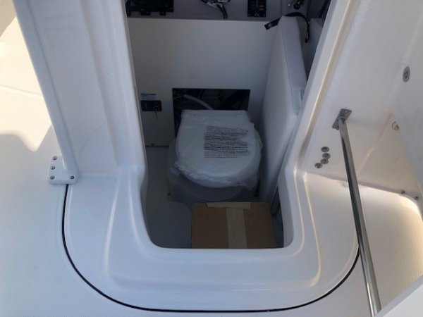 Generally, a Sportfisherman will be a large craft with a fly bridge and outriggers designed to pursue big game fish.  These will be 35 feet up in length and contain all of the amenities to handle heavy blue water.