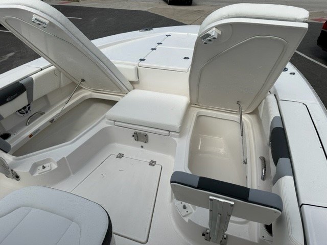 Glass fibers either loose or woven, reinforced with resin and used in the construction of many boats.