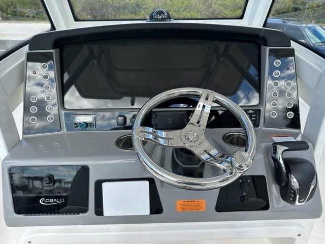 Glass fibers either loose or woven, reinforced with resin and used in the construction of many boats.