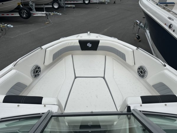 Zipping about on skis established a reference point for watery adventure. Truly hardy souls could push the envelope by ski-jumping a ramp or by not using skis at all - barefooting seemed to be the very edge of watersports world.