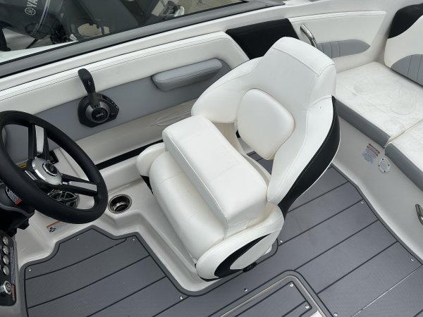 Zipping about on skis established a reference point for watery adventure. Truly hardy souls could push the envelope by ski-jumping a ramp or by not using skis at all - barefooting seemed to be the very edge of watersports world.