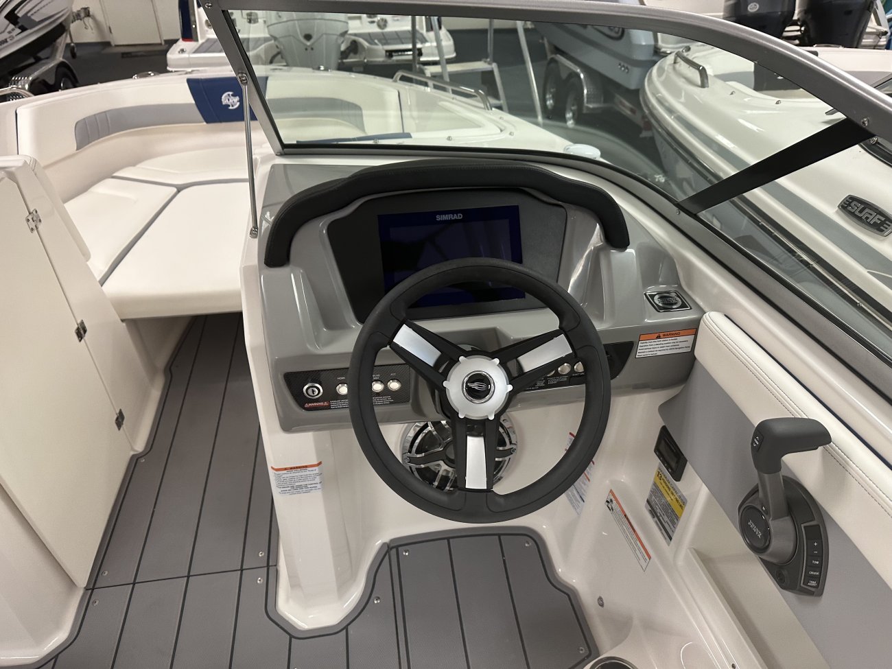 Glass fibers either loose or woven, reinforced with resin and used in the construction of many boats.