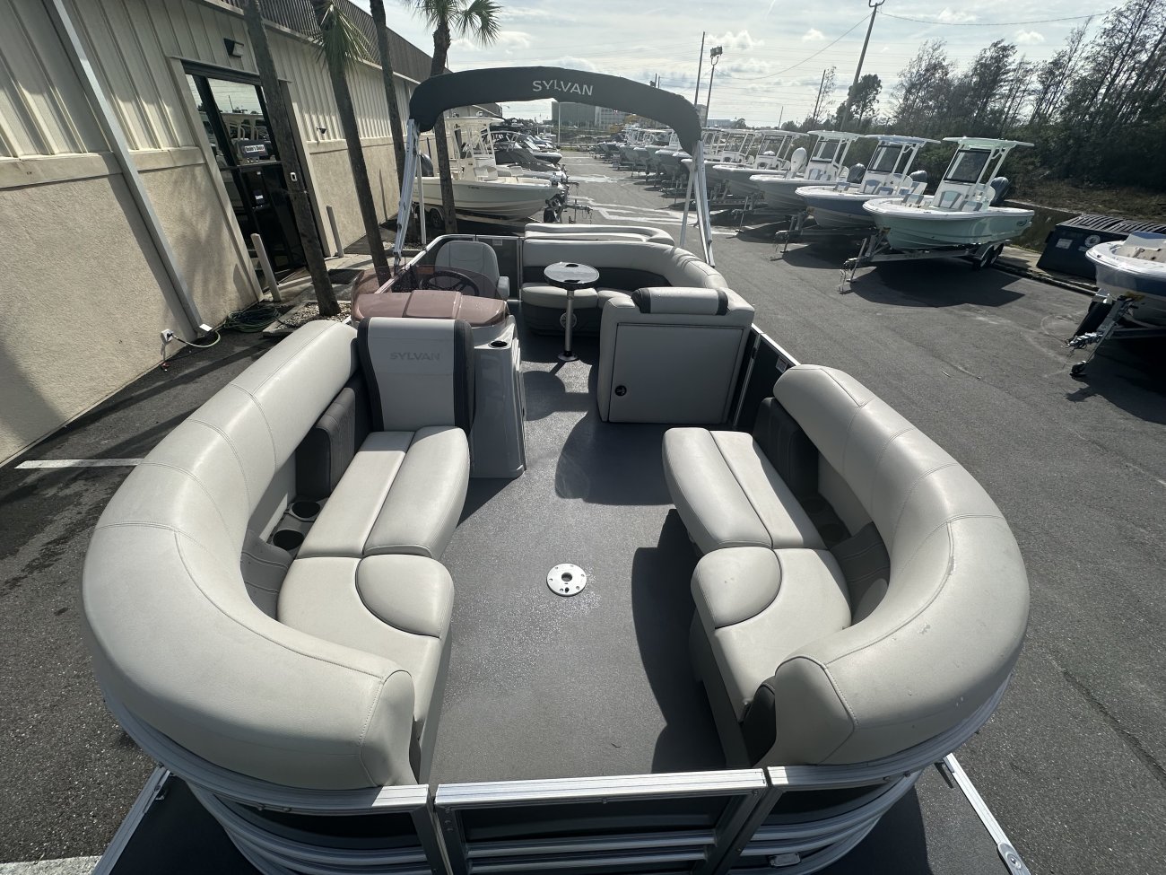 A pontoon boat is constructed from closed cylinders that support a platform. They offer the best value in terms of capacity to price. As a result pontoons are typically purchased for pleasure boating rather than serious fishing.
