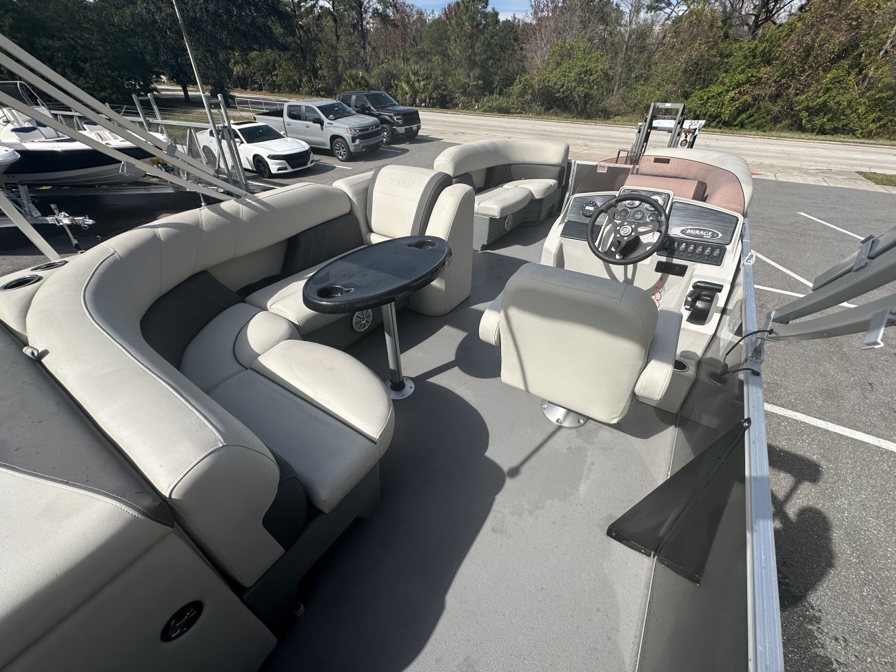 A pontoon boat is constructed from closed cylinders that support a platform. They offer the best value in terms of capacity to price. As a result pontoons are typically purchased for pleasure boating rather than serious fishing.