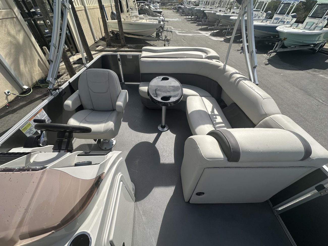 The definition of an outboard motor is a detachable engine mounted on outboard brackets on the stern of your boat.  This configuration will have only one single engine.