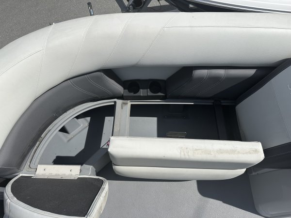 The definition of an outboard motor is a detachable engine mounted on outboard brackets on the stern of your boat.  This configuration will have only one single engine.