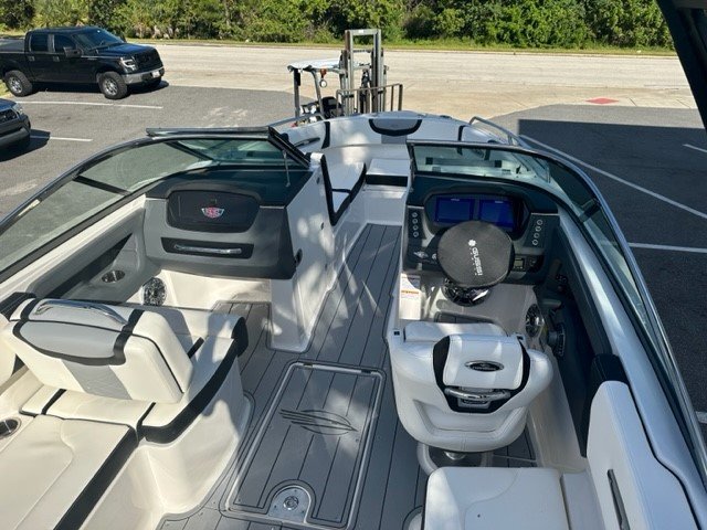 A bow rider is a boat with an open bow area where there are extra seats in front of the windshield.  Bow riders are typically between 17' and 30'long. They are well suited for many recreational water sports such as tubing, water skiing, and swimming.