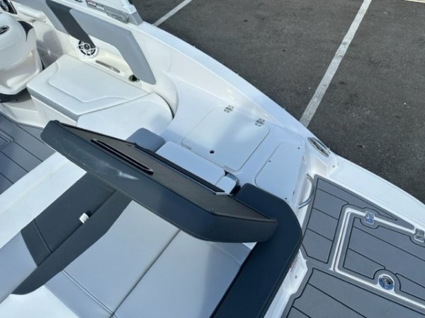 Zipping about on skis established a reference point for watery adventure. Truly hardy souls could push the envelope by ski-jumping a ramp or by not using skis at all - barefooting seemed to be the very edge of watersports world.