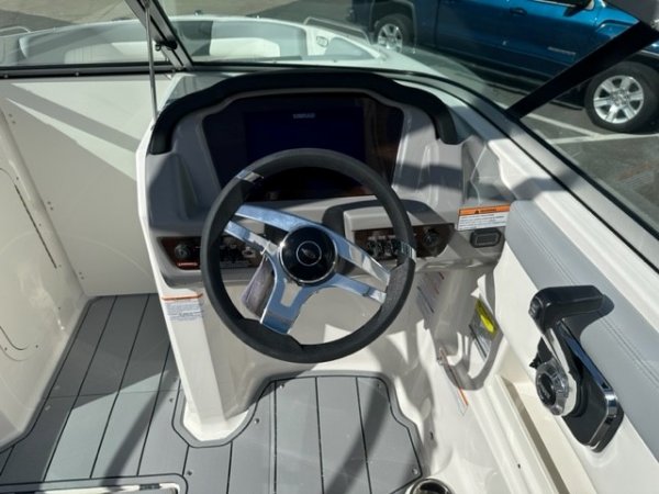 Glass fibers either loose or woven, reinforced with resin and used in the construction of many boats.