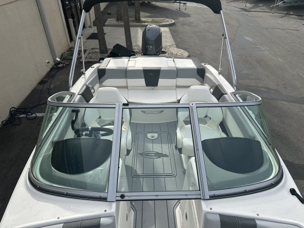 Zipping about on skis established a reference point for watery adventure. Truly hardy souls could push the envelope by ski-jumping a ramp or by not using skis at all - barefooting seemed to be the very edge of watersports world.