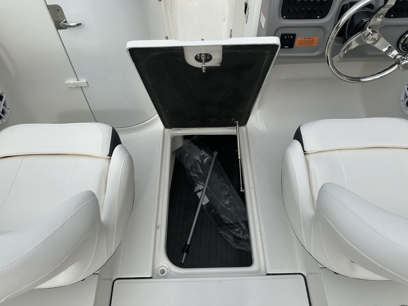 Wakeboarders want a giant wake to launch from as they cross from left to right behind the boat. With the engine set back against the transom, these boats carve a steep, large wake that riders love.