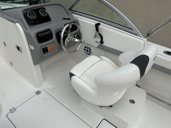 The definition of an outboard motor is a detachable engine mounted on outboard brackets on the stern of your boat.  This configuration will have only one single engine.