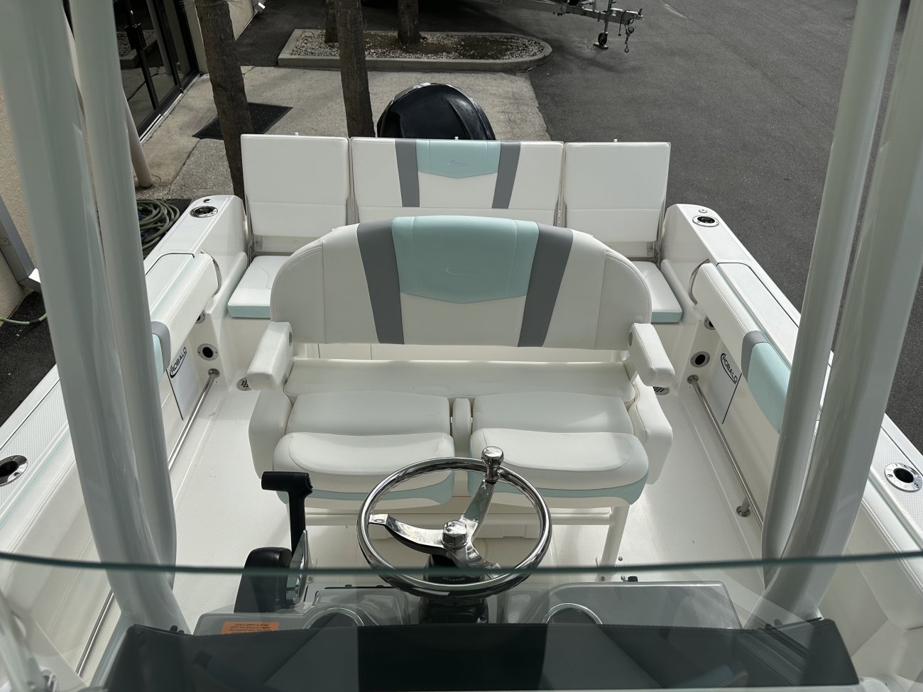 Wakeboarders want a giant wake to launch from as they cross from left to right behind the boat. With the engine set back against the transom, these boats carve a steep, large wake that riders love.