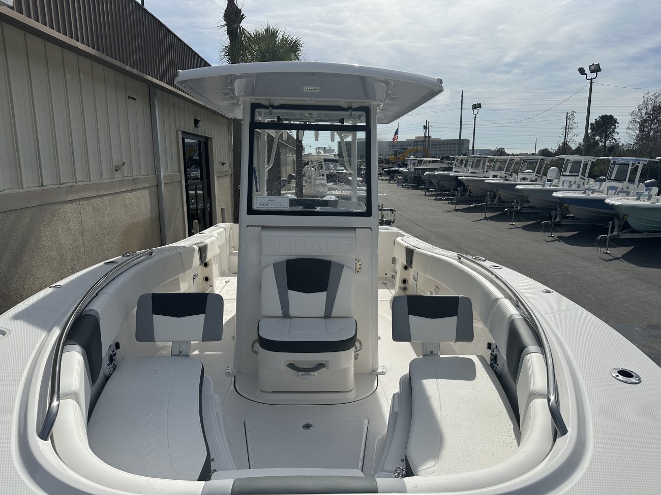 Glass fibers either loose or woven, reinforced with resin and used in the construction of many boats.