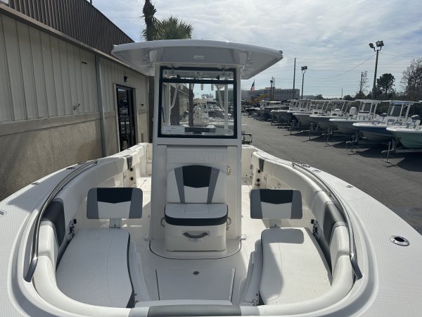 Glass fibers either loose or woven, reinforced with resin and used in the construction of many boats.