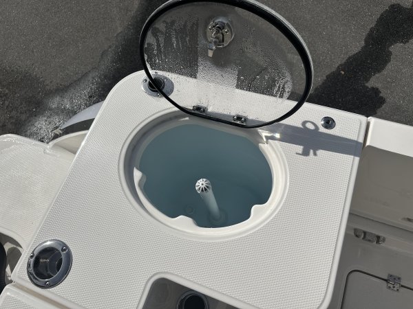 Glass fibers either loose or woven, reinforced with resin and used in the construction of many boats.