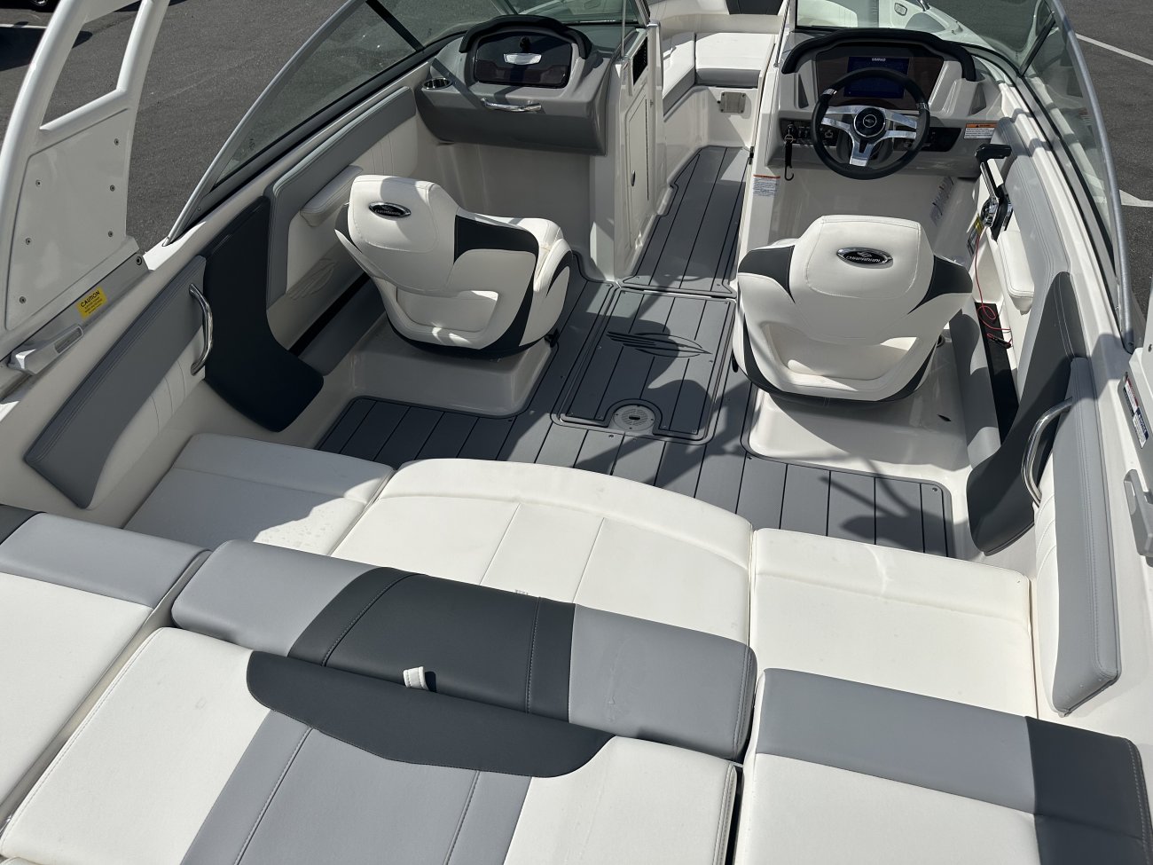 Wakeboarders want a giant wake to launch from as they cross from left to right behind the boat. With the engine set back against the transom, these boats carve a steep, large wake that riders love.