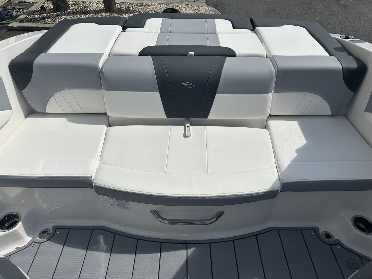 A dual console boat is typically one that was designed for salt water fishing and has the console split around a center walk thru to the bow.  The helm is usually starboard while there is passenger seating to port.
