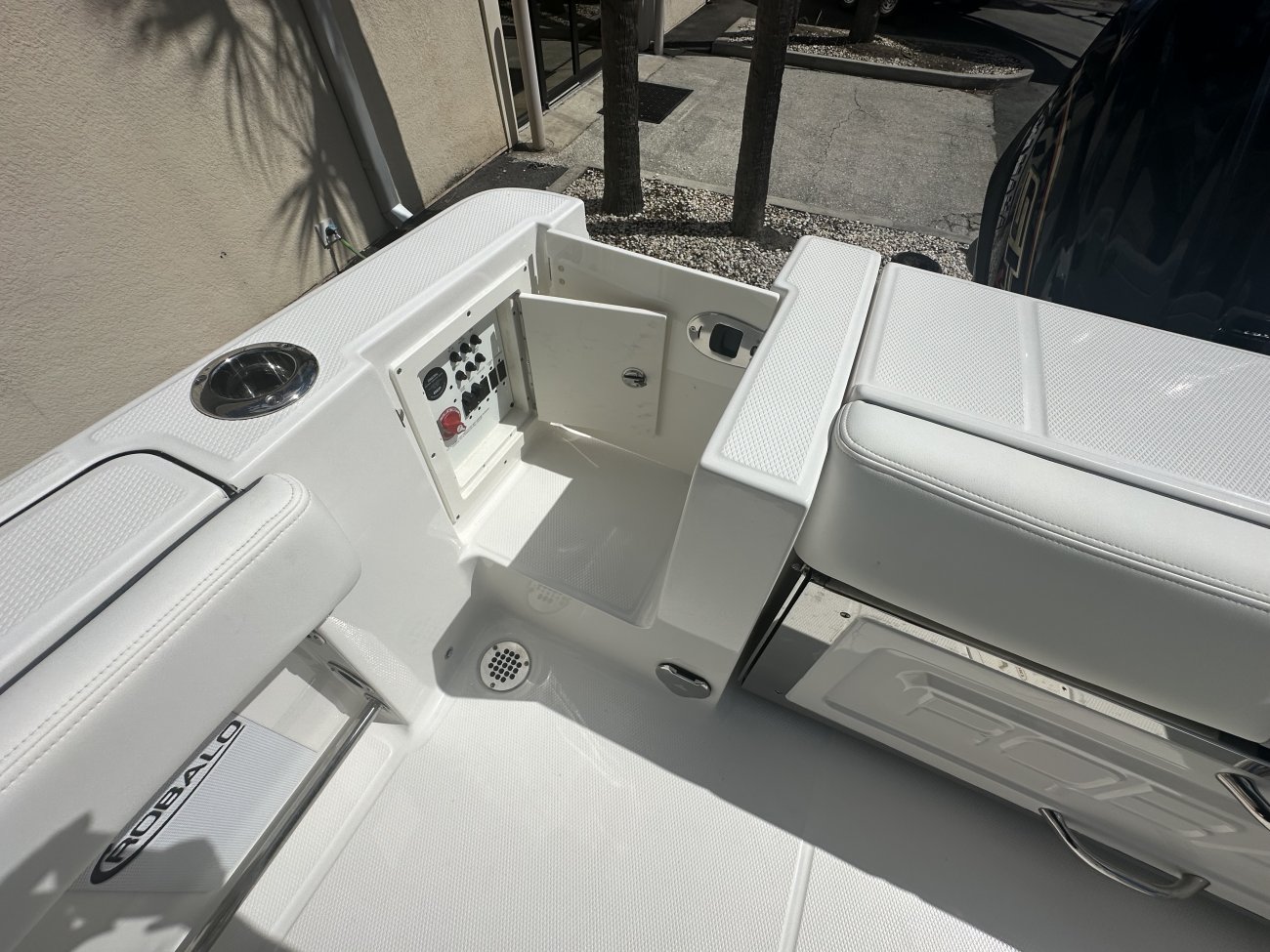 Glass fibers either loose or woven, reinforced with resin and used in the construction of many boats.