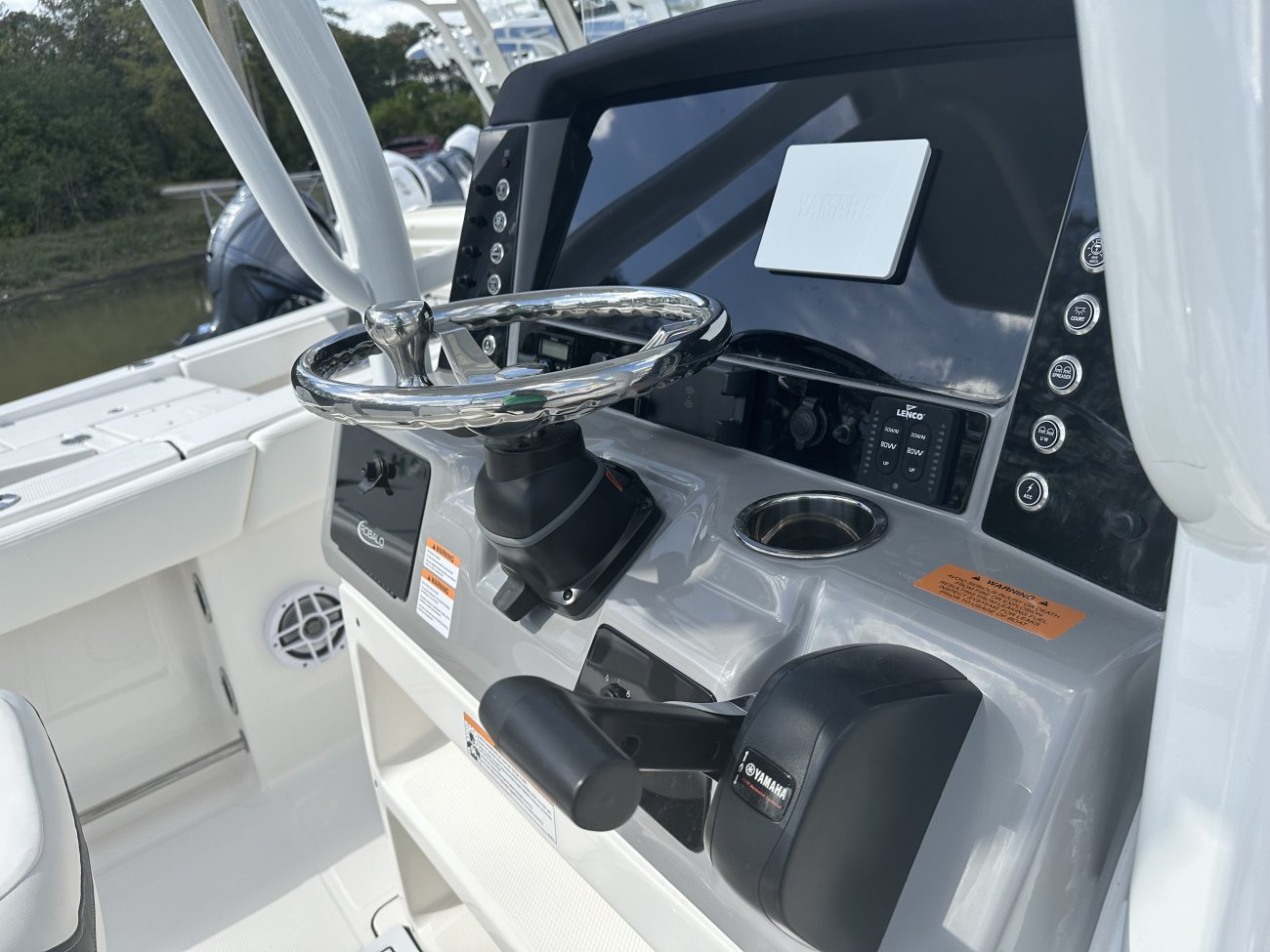 Center console is an open hull boat where the console of the boat is in the center. The boat deck surrounds the console so that a person can walk all around the boat from stern to bow with ease. Most center consoles are powered by outboard motors.