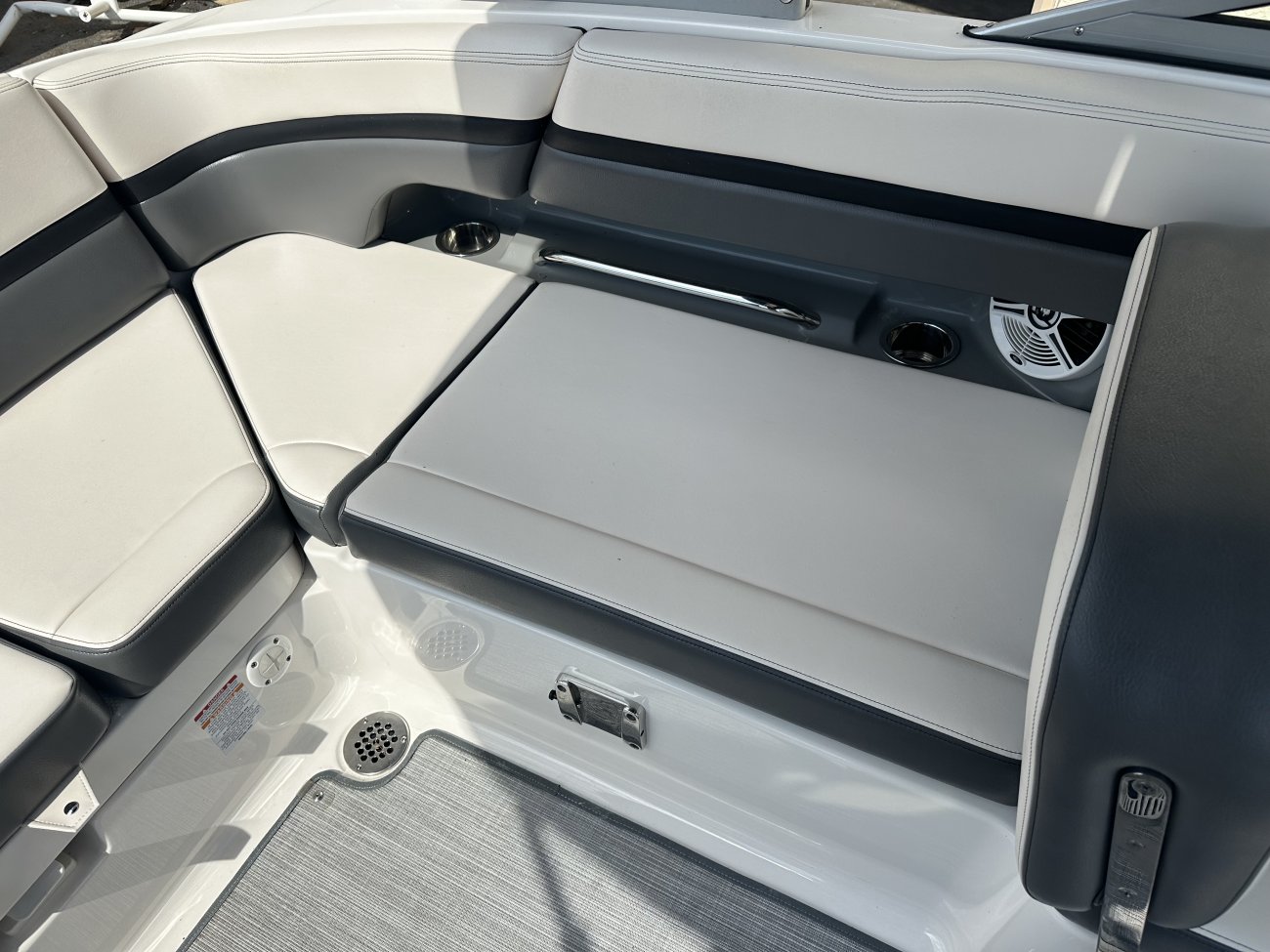 Glass fibers either loose or woven, reinforced with resin and used in the construction of many boats.