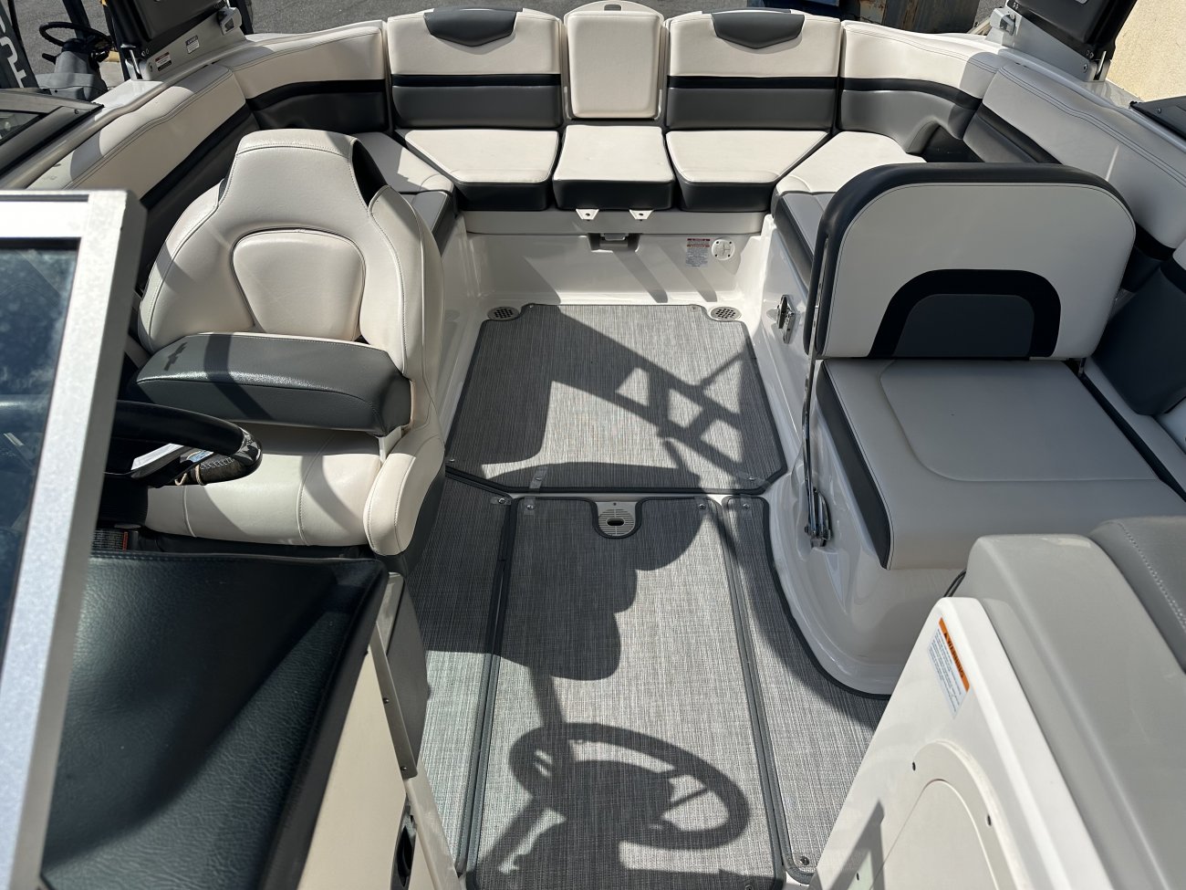 Zipping about on skis established a reference point for watery adventure. Truly hardy souls could push the envelope by ski-jumping a ramp or by not using skis at all - barefooting seemed to be the very edge of watersports world.