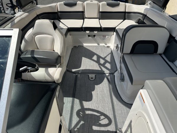 Zipping about on skis established a reference point for watery adventure. Truly hardy souls could push the envelope by ski-jumping a ramp or by not using skis at all - barefooting seemed to be the very edge of watersports world.